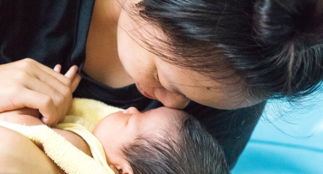 Mor og barn på Nådehjemmet