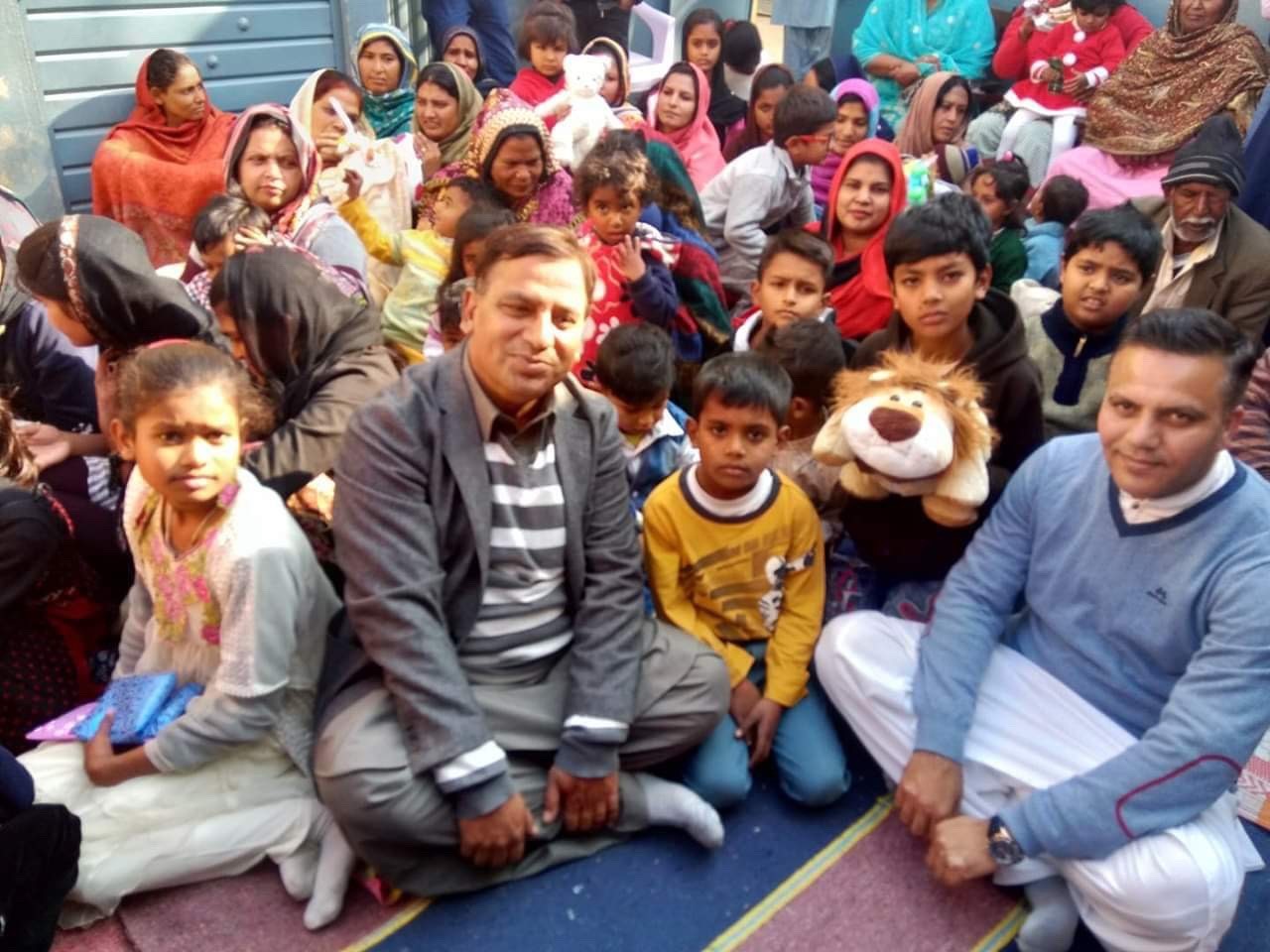 Mian Safdar with people from the congregation