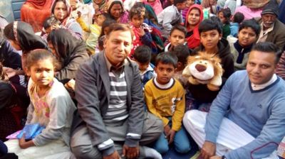 Mian Safdar with people from the congregation